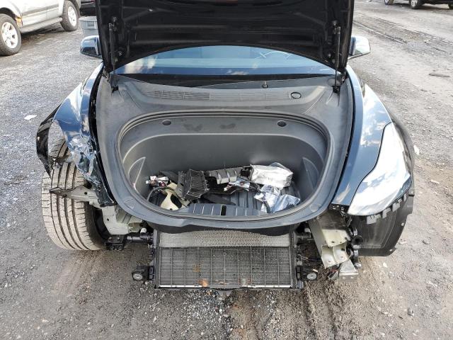Photo 11 from auction – 2022 TESLA MODEL 3 with VIN 5YJ3E1EC7NF233454