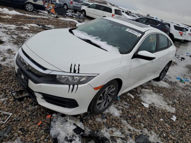 HONDA CIVIC EX 2018 with VIN 19XFC2F77JE207561 - Photo from auction
