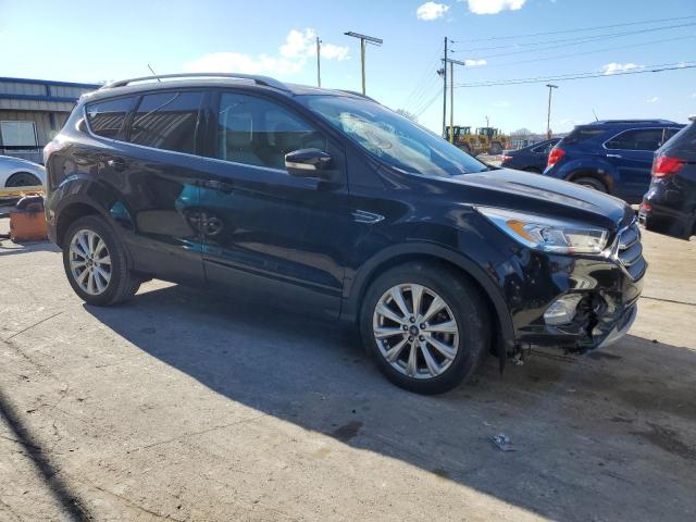 Photo 4 from auction – 2017 FORD ESCAPE TIT with VIN 1FMCU9JD0HUC13599
