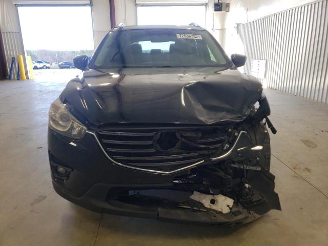 Photo 5 from auction – 2016 MAZDA CX-5 TOURI with VIN JM3KE2CY3G0649820