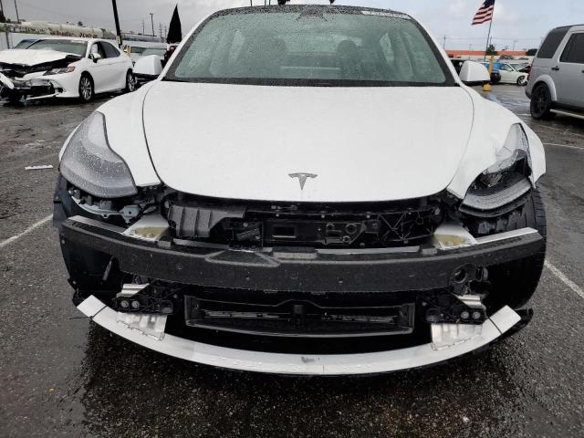 Photo 5 from auction – 2021 TESLA MODEL 3 with VIN 5YJ3E1EA6MF002123