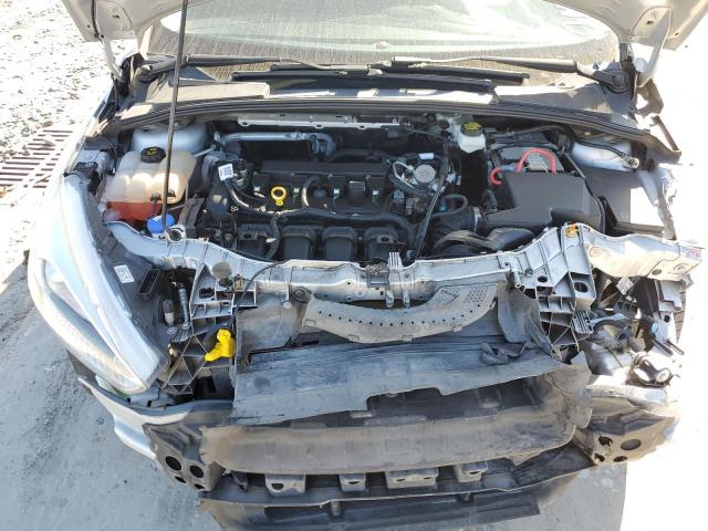 Photo 11 from auction – 2018 FORD FOCUS S with VIN 1FADP3E22JL210713