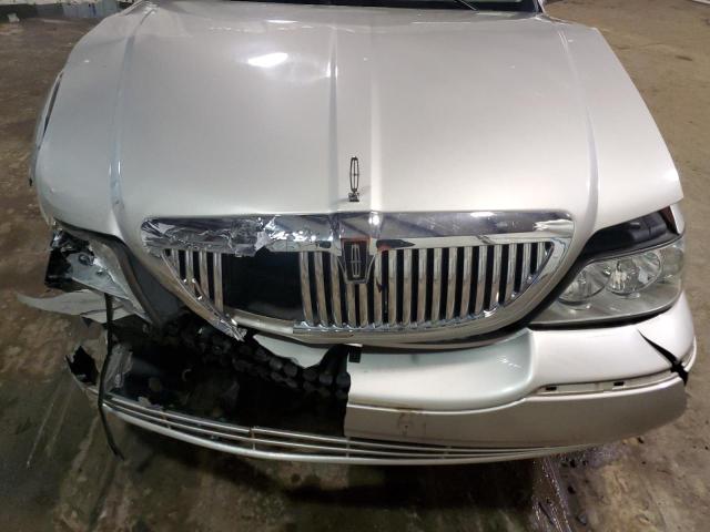 Photo 11 from auction – 2004 LINCOLN TOWN CAR E with VIN 1LNHM81WX4Y628272