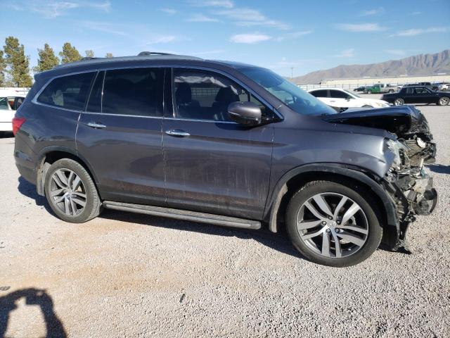 Photo 4 from auction – 2016 HONDA PILOT ELIT with VIN 5FNYF6H02GB025924