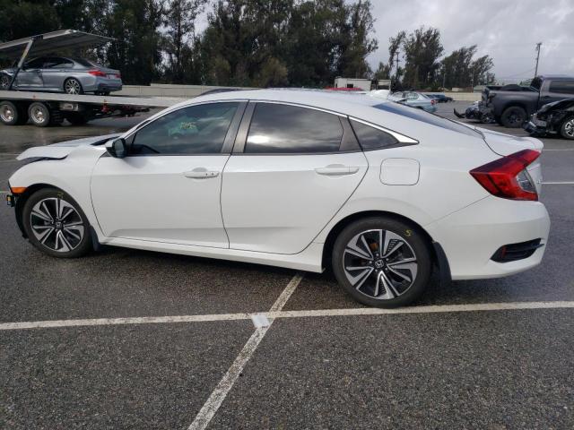Photo 2 from auction – 2016 HONDA CIVIC EX with VIN 2HGFC1F38GH659718