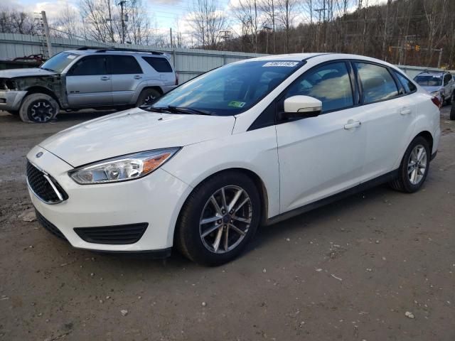 FORD FOCUS SE 2016 with VIN 1FADP3F24GL269575 - Photo from auction
