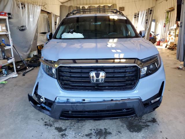 Photo 5 from auction – 2022 HONDA RIDGELINE with VIN 5FPYK3F72NB021130