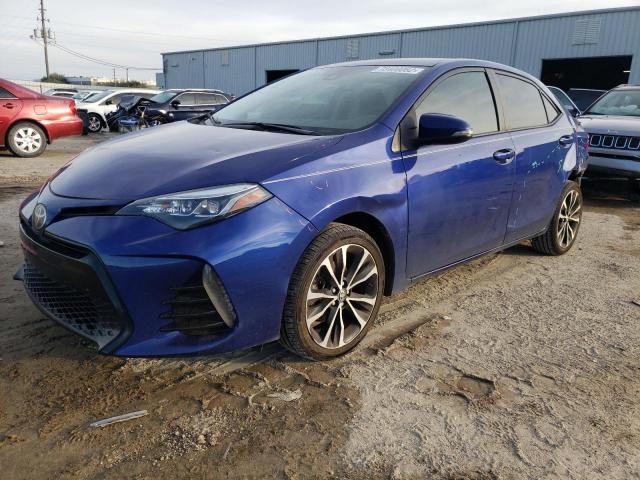 TOYOTA COROLLA L 2018 with VIN 5YFBURHE2JP776350 - Photo from auction