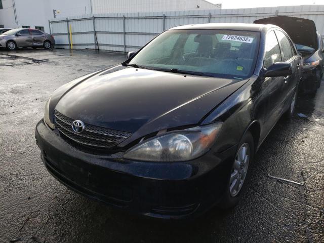 TOYOTA CAMRY LE 2002 with VIN JTDBE32K020066593 - Photo from auction