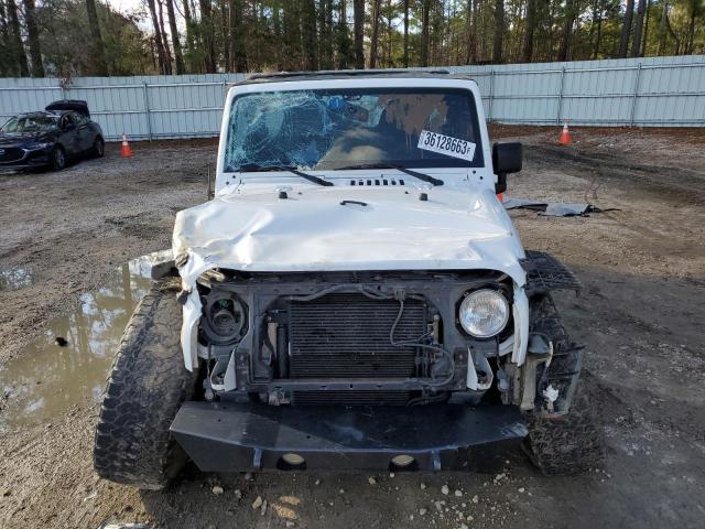 Photo 5 from auction – 2013 JEEP WRANGLER U with VIN 1C4HJWDG4DL520359