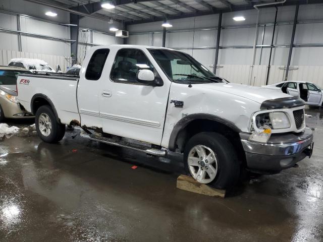 Photo 4 from auction – 2002 FORD F150 with VIN 1FTRX18L52NB74241
