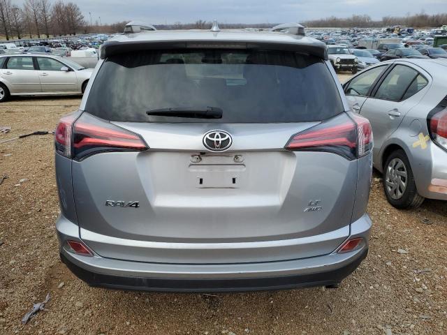 Photo 6 from auction – 2018 TOYOTA RAV4 LE with VIN JTMBFREV0JD255807