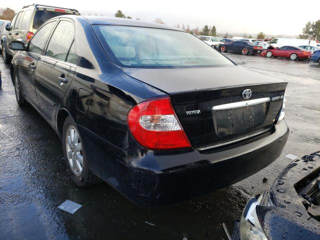 Photo 2 from auction – 2002 TOYOTA CAMRY LE with VIN JTDBE32K020066593