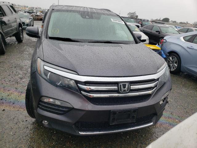 Photo 5 from auction – 2017 HONDA PILOT ELIT with VIN 5FNYF6H0XHB028068
