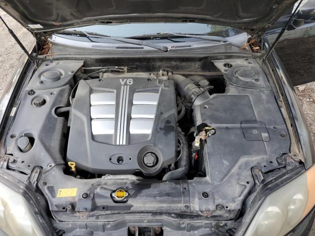Photo 11 from auction – 2003 HYUNDAI TIBURON with VIN KMHHN65F23U029075