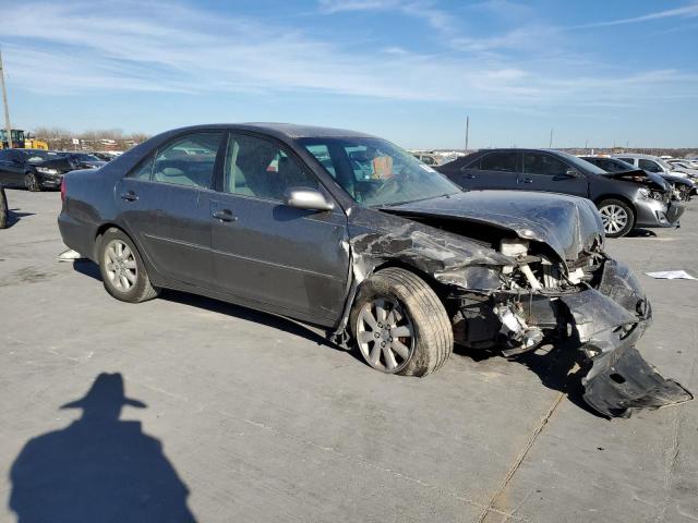 Photo 4 from auction – 2004 TOYOTA CAMRY LE with VIN 4T1BE30K04U807951