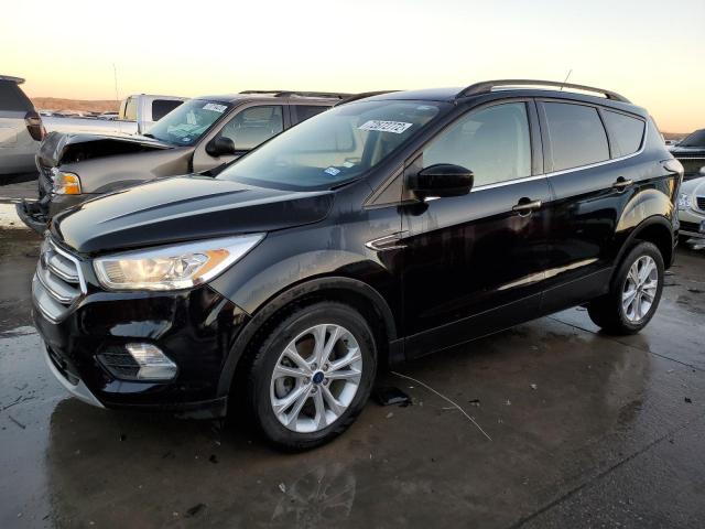 FORD ESCAPE SEL 2018 with VIN 1FMCU0HD0JUB70566 - Photo from auction