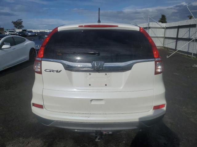 Photo 6 from auction – 2015 HONDA CR-V LX with VIN 5J6RM3H30FL012274