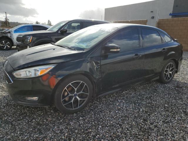 FORD FOCUS SE 2016 with VIN 1FADP3F25GL276065 - Photo from auction