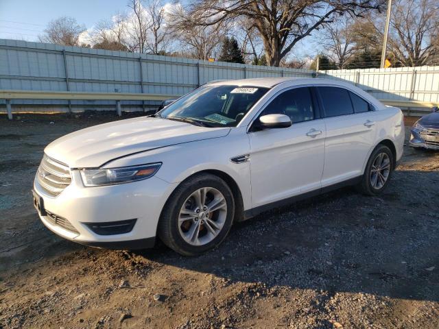 FORD TAURUS SEL 2014 with VIN 1FAHP2E81EG174950 - Photo from auction