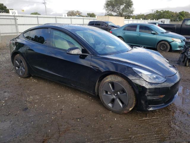 Photo 4 from auction – 2021 TESLA MODEL 3 with VIN 5YJ3E1EA6MF018287