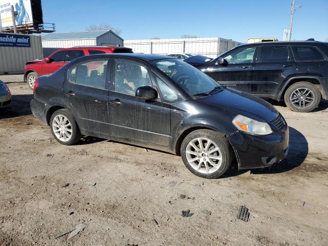 Photo 4 from auction – 2011 SUZUKI SX4 LE with VIN JS2YC5A26B6300395