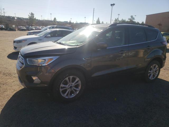 FORD ESCAPE SE 2018 with VIN 1FMCU9GD5JUB34832 - Photo from auction
