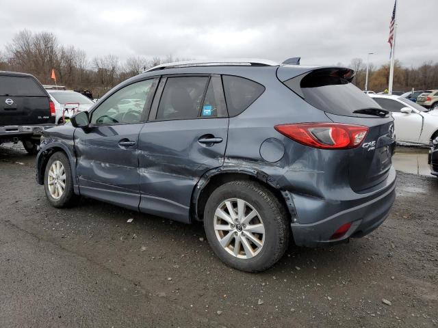 Photo 2 from auction – 2013 MAZDA CX-5 TOURI with VIN JM3KE4CE5D0122732