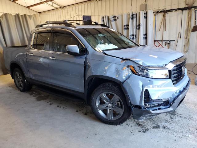 Photo 4 from auction – 2022 HONDA RIDGELINE with VIN 5FPYK3F72NB021130