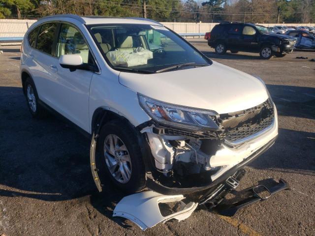 Photo 4 from auction – 2016 HONDA CR-V EXL with VIN 5J6RM3H77GL021882