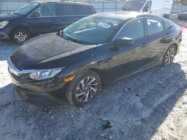Photo 1 from auction – 2018 HONDA CIVIC EX with VIN 19XFC2F70JE011350