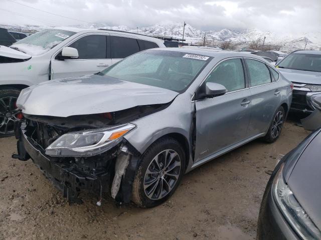 TOYOTA AVALON HYB 2016 with VIN 4T1BD1EB2GU053696 - Photo from auction