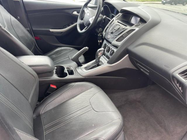 Photo 5 from auction – 2014 FORD FOCUS SE with VIN 1FADP3F2XEL302754