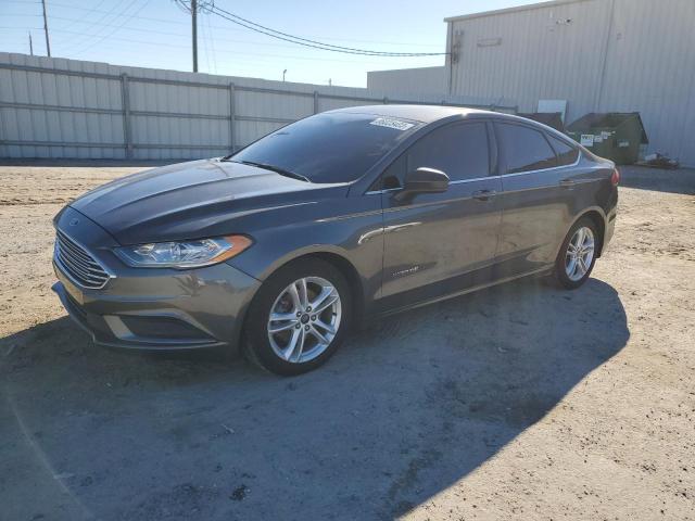 FORD FUSION SE 2018 with VIN 3FA6P0LU0JR141372 - Photo from auction