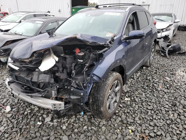 HONDA CR-V EXL 2017 with VIN 5J6RW2H80HL010981 - Photo from auction