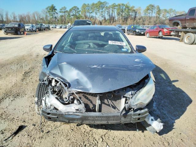 Photo 5 from auction – 2014 TOYOTA COROLLA L with VIN 5YFBURHE9EP086732