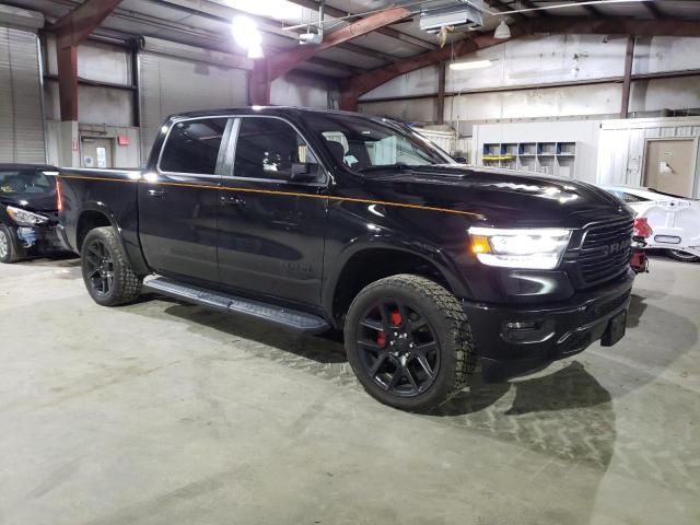 Photo 4 from auction – 2021 RAM 1500 LARAM with VIN 1C6SRFJTXMN611390