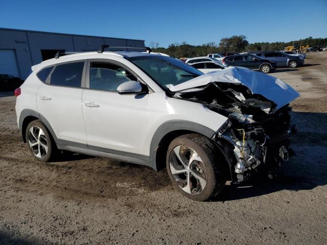 Photo 4 from auction – 2016 HYUNDAI TUCSON LIM with VIN KM8J33A24GU205946