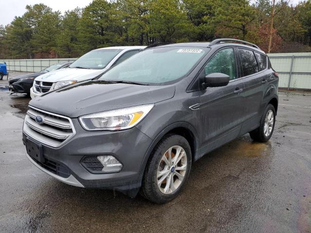 FORD ESCAPE SE 2018 with VIN 1FMCU9GD9JUD33074 - Photo from auction