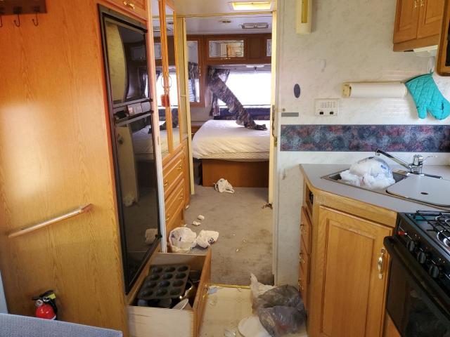 Photo 10 from auction – 1998 FORD ECONOLINE with VIN 1FDXE40S2WHB39836