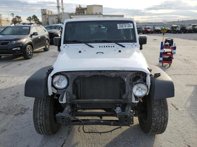 Photo 5 from auction – 2015 JEEP WRANGLER U with VIN 1C4BJWDG3FL677826