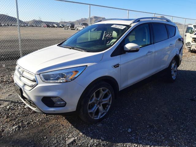FORD ESCAPE TIT 2018 with VIN 1FMCU9J93JUB86464 - Photo from auction