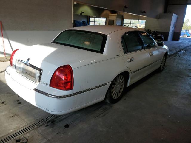 Photo 3 from auction – 2003 LINCOLN TOWN CAR E with VIN 1LNHM81W83Y684449
