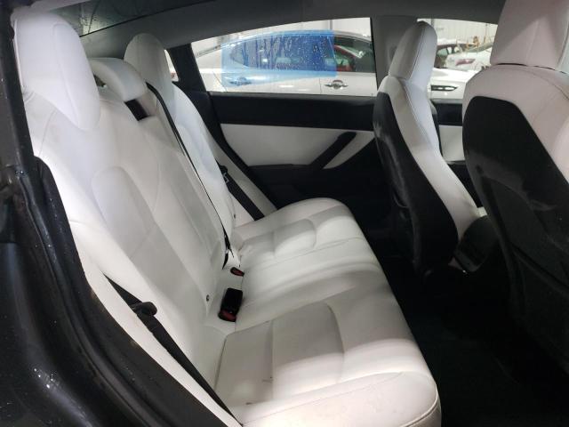 Photo 10 from auction – 2018 TESLA MODEL 3 with VIN 5YJ3E1EB2JF099437