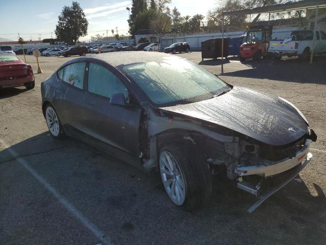 Photo 4 from auction – 2022 TESLA MODEL 3 with VIN 5YJ3E1EA1NF143828