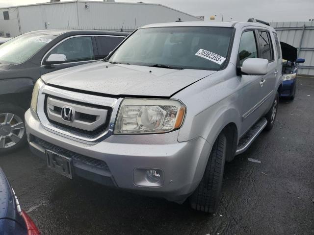HONDA PILOT TOUR 2011 with VIN 5FNYF3H90BB030495 - Photo from auction