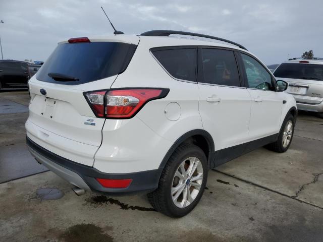Photo 3 from auction – 2018 FORD ESCAPE SE with VIN 1FMCU9GD1JUB62143