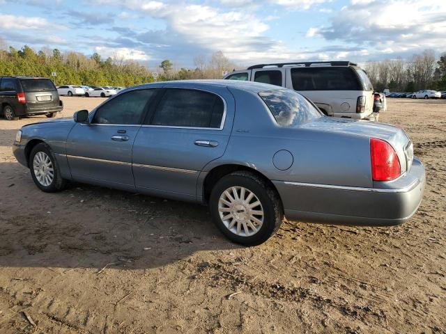 Photo 2 from auction – 2004 LINCOLN TOWN CAR E with VIN 1LNHM81W54Y644928