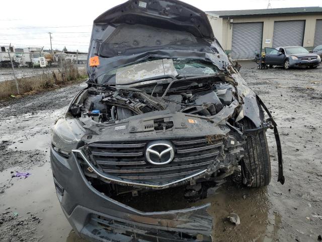 Photo 5 from auction – 2016 MAZDA CX-5 GT with VIN JM3KE2DY5G0669257