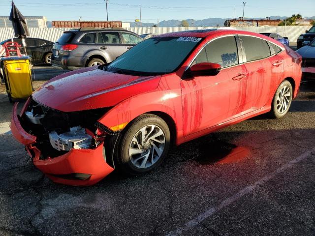 HONDA CIVIC EX 2018 with VIN 2HGFC2F76JH570696 - Photo from auction